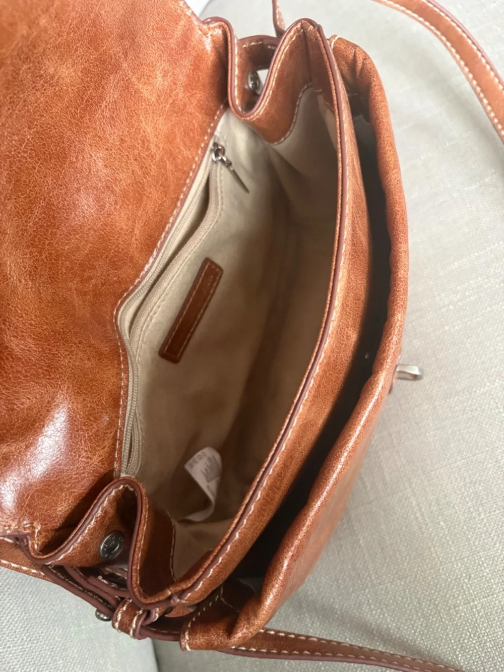 CHARLES & KEITH Delfina Chain Crossbody Bag in Distressed Tan